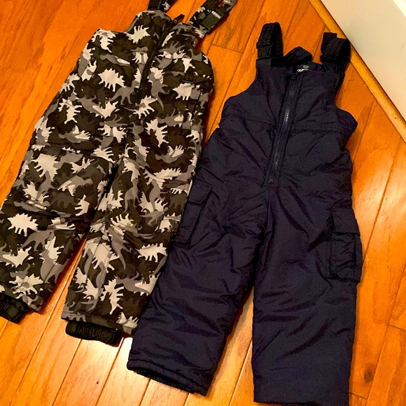Pair of front zipper toddlers winter overalls. Keep them warm